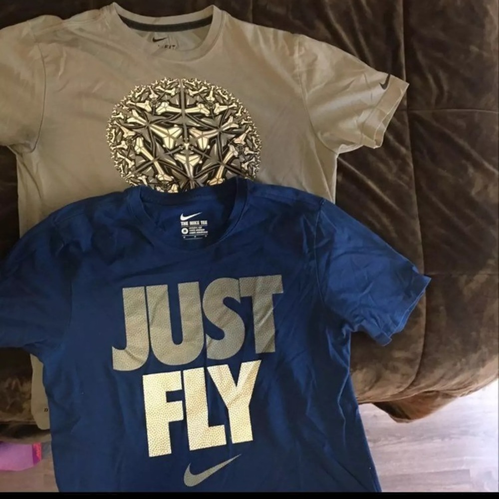 Two Nike shirts